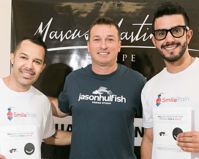 Jason Hulfish smiling with Marcus Martinelli and Helcio Junior